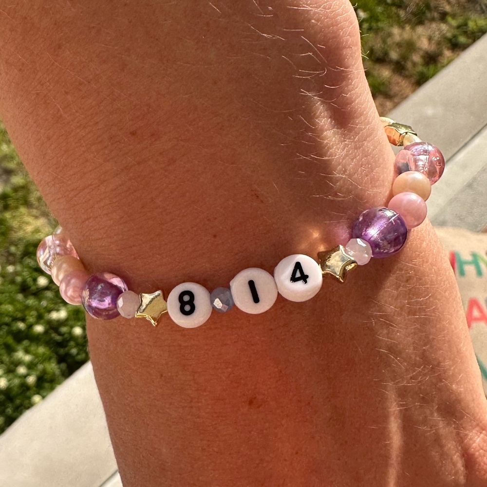 Custom Taylor Swift inspired friendship bracelet with cross charm